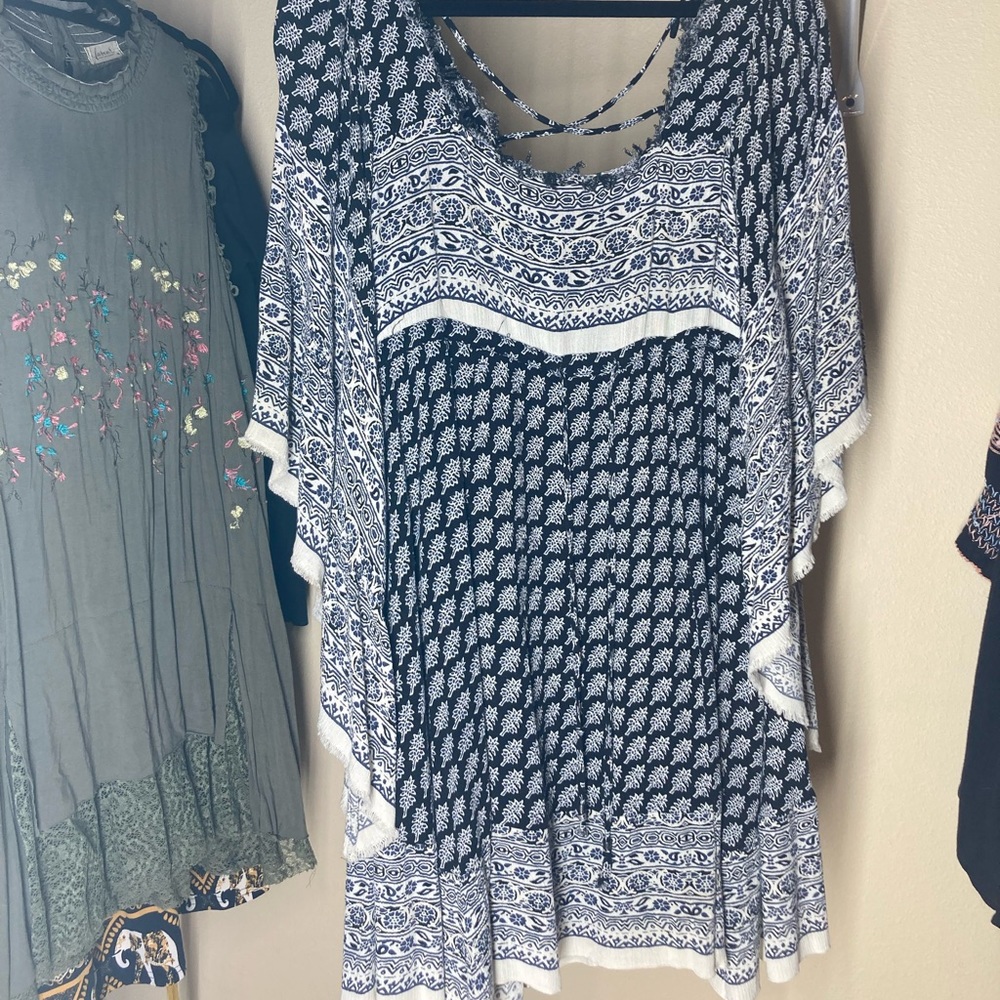 Free People white and navy mini dress with bell sleeves.